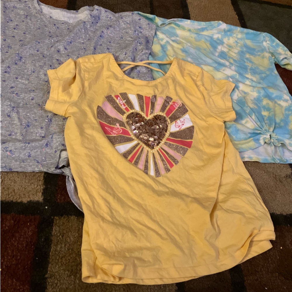 lot of 3 shirts that are slightly worn. these shirts are size 14
